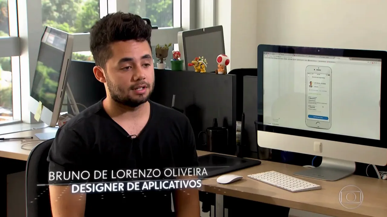 Bruno at his desk on Jornal Nacional, with his name and “Designer de aplicativos” in the lower third